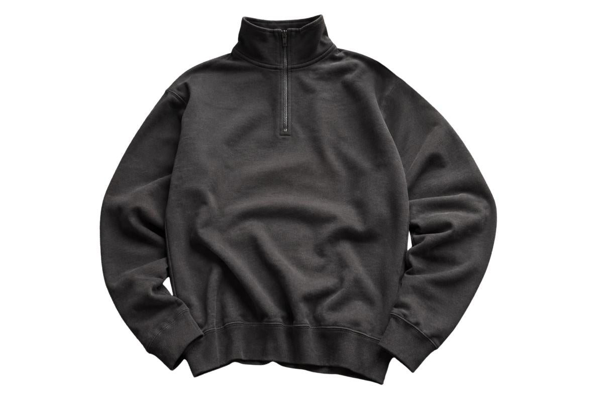 Black quarter-zip sweatshirt on a white background